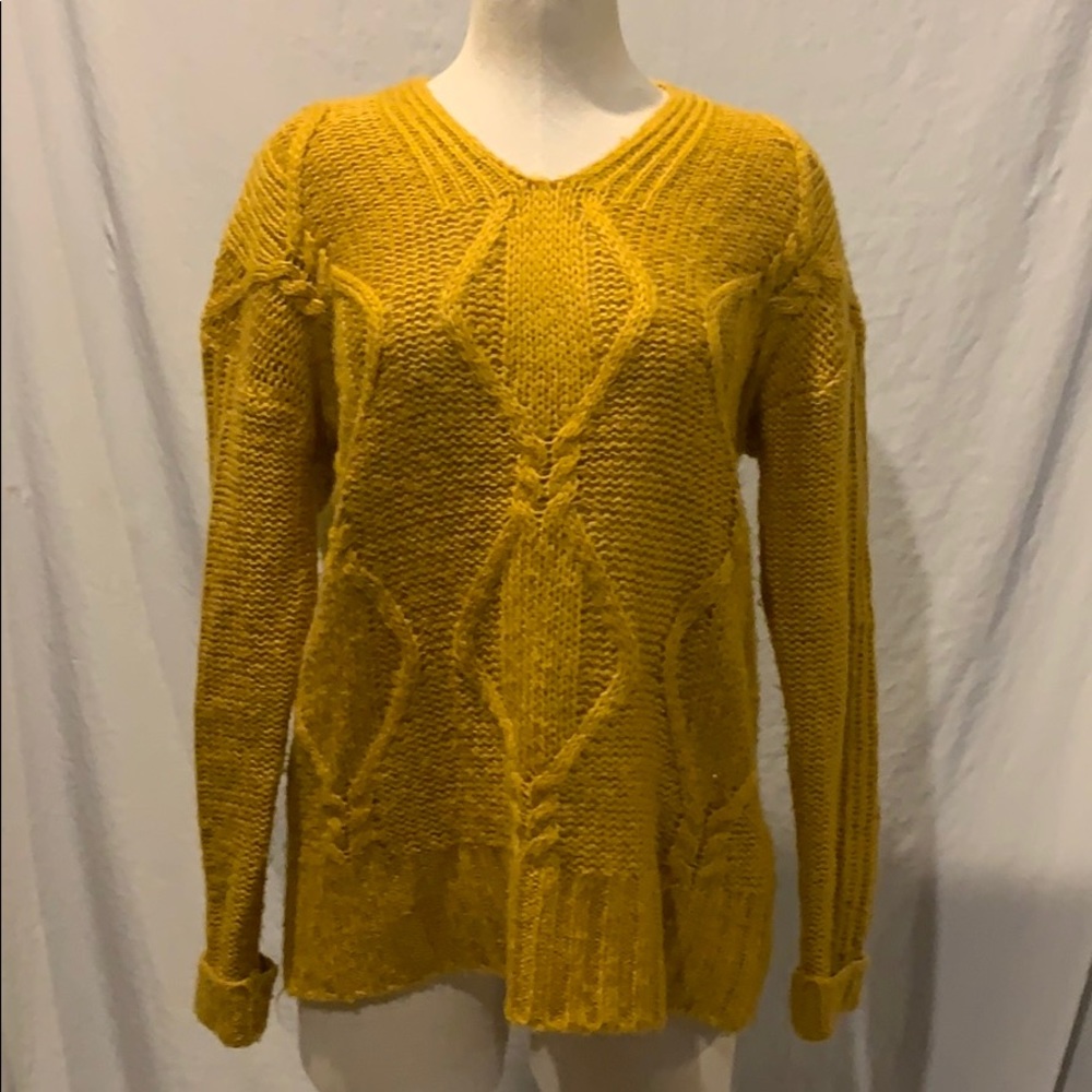 Mustard colored ladies knit sweater
